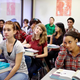 Illustration for article titled Seventh-Grade Class Scrambling To Piece Together Teacher’s Home Life From Desktop Background Before PowerPoint Opened